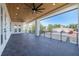 Spacious balcony with wood ceilings, tile flooring and view at 6012 Kipps Colony E Dr, Gulfport, FL 33707