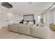 Elegant home theater with large screen, projector, and comfortable seating at 6012 Kipps Colony E Dr, Gulfport, FL 33707