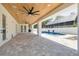 Relaxing covered patio overlooking the pool at 6012 Kipps Colony E Dr, Gulfport, FL 33707