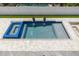 Luxury pool and spa with tile and water features at 6012 Kipps Colony E Dr, Gulfport, FL 33707