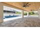 Outdoor patio with wood ceilings and pool view at 6012 Kipps Colony E Dr, Gulfport, FL 33707
