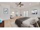 Bright and airy main bedroom with a sitting area and plenty of natural light at 6012 Kipps Colony E Dr, Gulfport, FL 33707