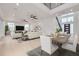 Spacious living room with light hardwood floors and comfortable seating at 6012 Kipps Colony E Dr, Gulfport, FL 33707