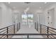 Modern home interior with high ceilings and a contemporary chandelier at 6012 Kipps Colony E Dr, Gulfport, FL 33707