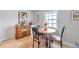 Cozy dining area with a small round table and four chairs at 5176 Salmon Se Dr # A, St Petersburg, FL 33705