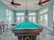 Game room with pool table and comfortable seating for entertainment at 5176 Salmon Se Dr # A, St Petersburg, FL 33705