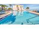 Inviting community pool with spa and lounge chairs at 5176 Salmon Se Dr # A, St Petersburg, FL 33705