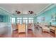 Relaxing community room featuring comfortable seating and hardwood floors at 5176 Salmon Se Dr # A, St Petersburg, FL 33705