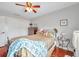 Charming bedroom with wood floors, ceiling fan and plenty of natural light at 5176 Salmon Se Dr # A, St Petersburg, FL 33705