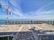 Community dock with cornhole and scenic waterfront views at 5176 Salmon Se Dr # A, St Petersburg, FL 33705