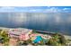 Community overview featuring waterfront property and pool at 5176 Salmon Se Dr # A, St Petersburg, FL 33705