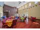 Large community room with various tables and colorful tablecloths at 5176 Salmon Se Dr # A, St Petersburg, FL 33705