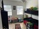 Bright bedroom with bunkbeds and natural lighting coming through the windows at 15536 Bristol E Cir, Clearwater, FL 33764