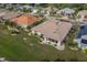 Single-story home with solar panels and a well-maintained lawn at 739 Winterbrooke Way, Sun City Center, FL 33573