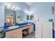 Bathroom with double sinks, large mirror, and ample counter space at 739 Winterbrooke Way, Sun City Center, FL 33573