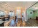 Inviting foyer with tile flooring, chandelier, and view into dining room and entry at 739 Winterbrooke Way, Sun City Center, FL 33573