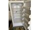 Empty white refrigerator interior with wire shelves and bins at 739 Winterbrooke Way, Sun City Center, FL 33573