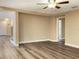 Bright and spacious living room with vinyl plank flooring and ceiling fan at 10708 Bamboo Rod Cir, Riverview, FL 33569