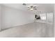 Spacious living room with tile flooring and ceiling fan at 1139 Sleepy Oak Dr, Wesley Chapel, FL 33543