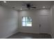 Bright living room with hardwood floors and recessed lighting at 4004 E Osborne Ave, Tampa, FL 33610