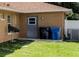 Exterior storage shed with trash cans, and satellite dish at 12739 Standbridge Dr, Riverview, FL 33579