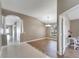 Bright dining room with wood-look flooring and a chandelier at 12739 Standbridge Dr, Riverview, FL 33579