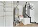 Garage with water heater and shelving for storage at 12739 Standbridge Dr, Riverview, FL 33579