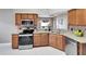 Updated kitchen with granite countertops and stainless steel appliances at 12739 Standbridge Dr, Riverview, FL 33579