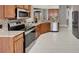 Well-equipped kitchen boasting stainless steel appliances and granite countertops at 12739 Standbridge Dr, Riverview, FL 33579