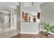 Kitchen with breakfast bar and view to entryway at 12739 Standbridge Dr, Riverview, FL 33579