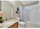 Bathroom with granite countertop, bathtub, and shower at 12739 Standbridge Dr, Riverview, FL 33579