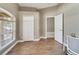 Home office with wood-look floors and large window at 12739 Standbridge Dr, Riverview, FL 33579