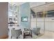 Modern condo lobby with comfortable seating and large TV at 777 N Ashley Dr # 1606, Tampa, FL 33602