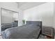 Bright bedroom with mirrored closet and modern nightstand at 777 N Ashley Dr # 1606, Tampa, FL 33602