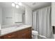 Bathroom with granite vanity and shower/tub combo at 777 N Ashley Dr # 1606, Tampa, FL 33602