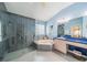 Bathroom with walk-in shower, soaking tub, and dual vanity at 739 Winterbrooke Way, Sun City Center, FL 33573