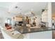 Modern kitchen with breakfast bar and granite countertops at 739 Winterbrooke Way, Sun City Center, FL 33573