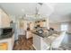 Spacious kitchen with island, granite counters, and modern appliances at 739 Winterbrooke Way, Sun City Center, FL 33573