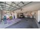 Garage with golf cart and ample storage at 739 Winterbrooke Way, Sun City Center, FL 33573