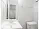 Clean bathroom with white subway tiles and vanity at 5300 6Th S Ave, St Petersburg, FL 33707