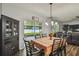 Dining area with sliding doors leading to backyard patio at 35744 Jenny Lynne Cir, Zephyrhills, FL 33541