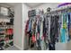 Well-organized closet with hanging rods and shoe storage at 35744 Jenny Lynne Cir, Zephyrhills, FL 33541