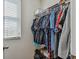 Large walk-in closet with ample hanging space and shelving at 35744 Jenny Lynne Cir, Zephyrhills, FL 33541