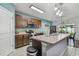 Modern kitchen with stainless steel appliances and island at 35744 Jenny Lynne Cir, Zephyrhills, FL 33541