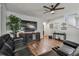 Relaxing living room with sectional sofa and wall-mounted TV at 35744 Jenny Lynne Cir, Zephyrhills, FL 33541
