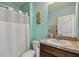 Simple bathroom with shower/tub combo and vanity at 35744 Jenny Lynne Cir, Zephyrhills, FL 33541