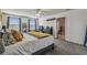 Main bedroom with king bed, ensuite bathroom access, and plenty of natural light at 35744 Jenny Lynne Cir, Zephyrhills, FL 33541