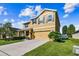 Two-story house with a two-car garage at 35744 Jenny Lynne Cir, Zephyrhills, FL 33541