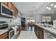 Modern kitchen with stainless steel appliances and ample cabinetry at 35744 Jenny Lynne Cir, Zephyrhills, FL 33541