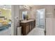 Elegant bathroom with double vanity and walk-in shower at 35744 Jenny Lynne Cir, Zephyrhills, FL 33541